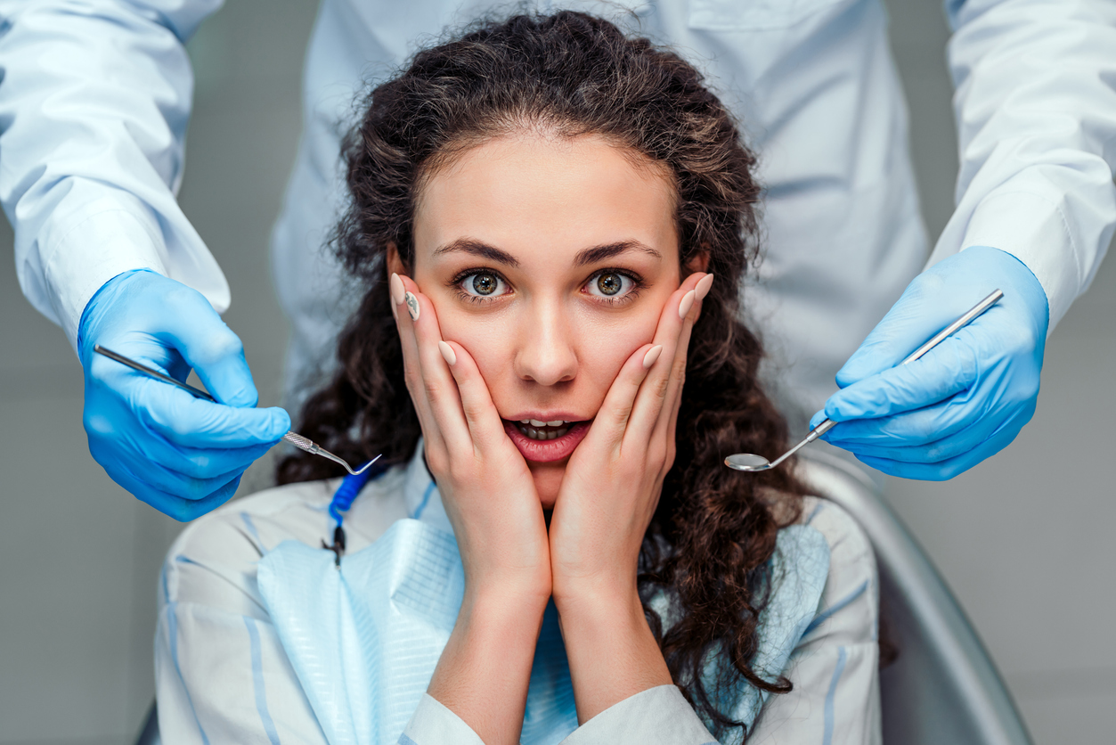 Worried woman nervous about the dentist